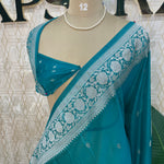 Teal Blue Banarasi Silk Saree With Silvar Zari Semi Chiffon
