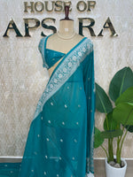 Teal Blue Banarasi Silk Saree With Silvar Zari Semi Chiffon